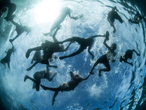 Local kids in the Solomon Islands swimming in the bountiful waters