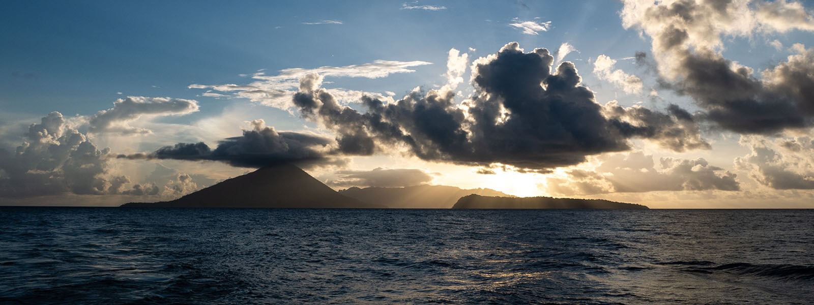 Sunset on the Banda Islands photographed on a Banda Islands snorkeling tour