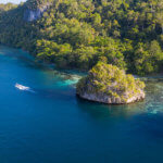 Aerial of the snorkeling group heading to a snorkel site in Raja Ampat.