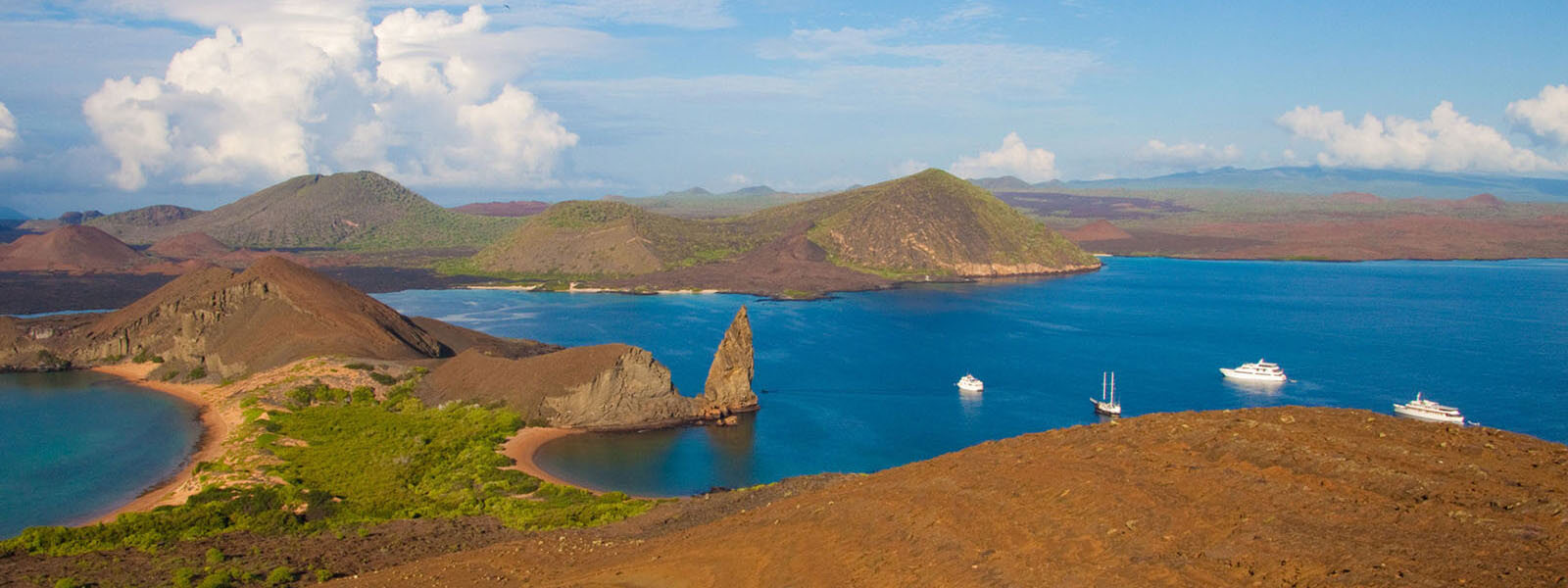 Galapagos islands view from Bartolome that we'll visit on our coral triangle adventures snorkeling tour